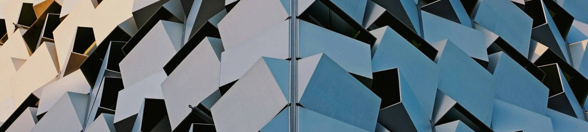 The iconic cheese grater building in Sheffield, displaying a building adorned with many triangular pieces.